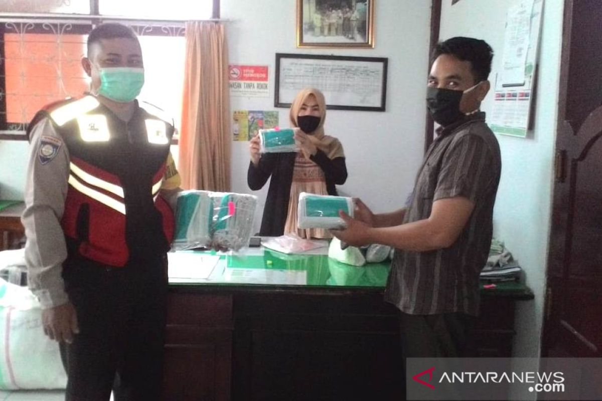 Polsek Curup awasi pembagian ribuan masker gratis