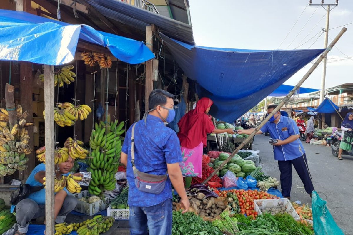 BRI Aceh bagikan masker untuk pedagang pasar
