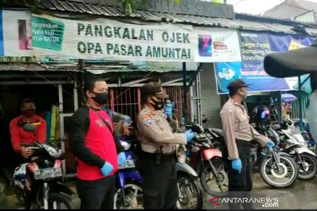 Kepolisian bantu kondisikan new normal