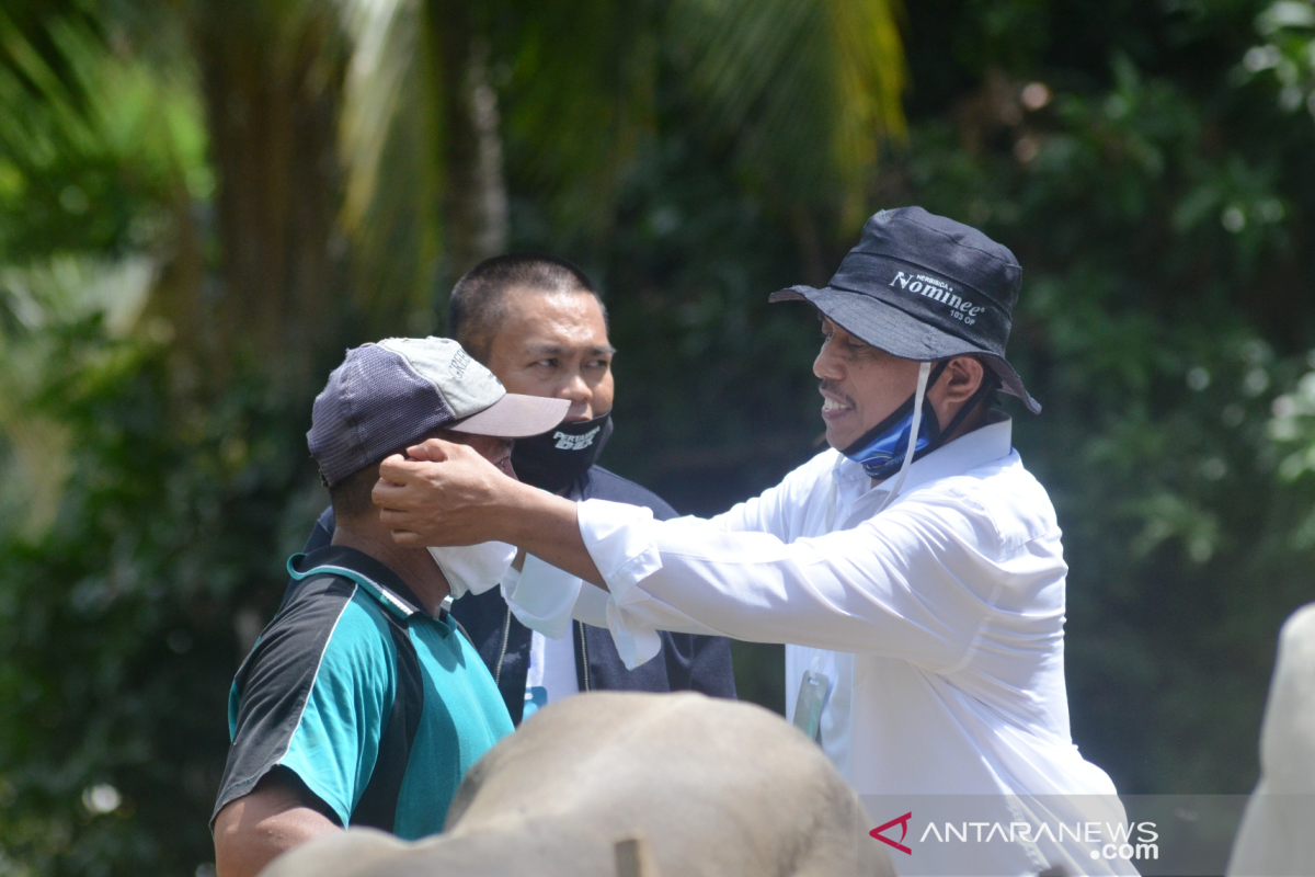 F-NasDem Gorontalo Utara salurkan bantuan masker dari Rachmad Gobel