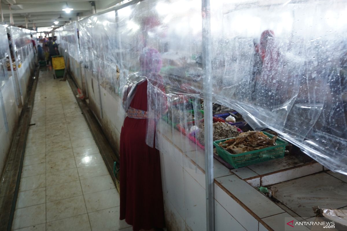 Implementing health protocols in wet markets remains challenging