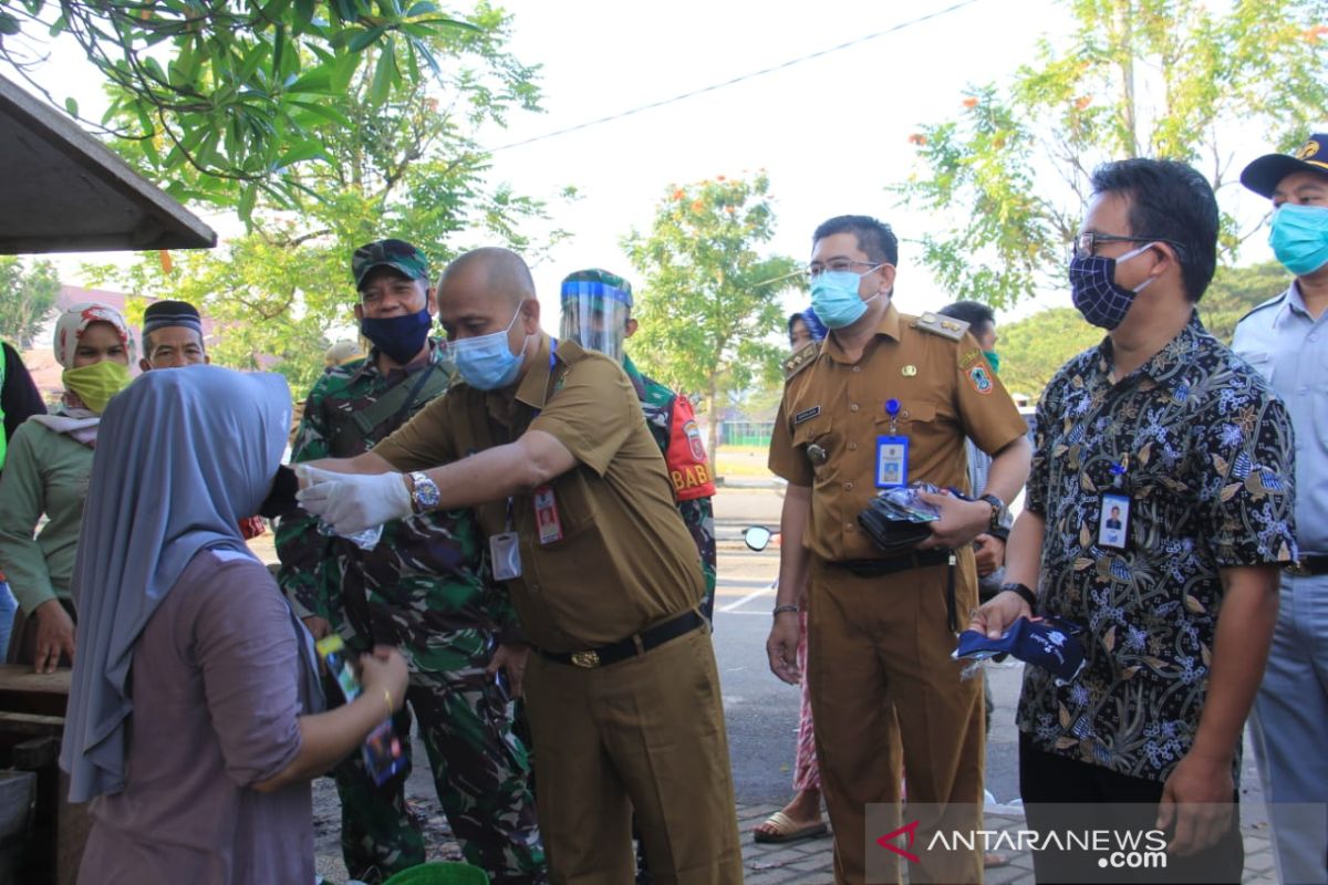 Sekda Pemkab Tapin sosialisai penghapusan denda pajak kendaraan di pasar