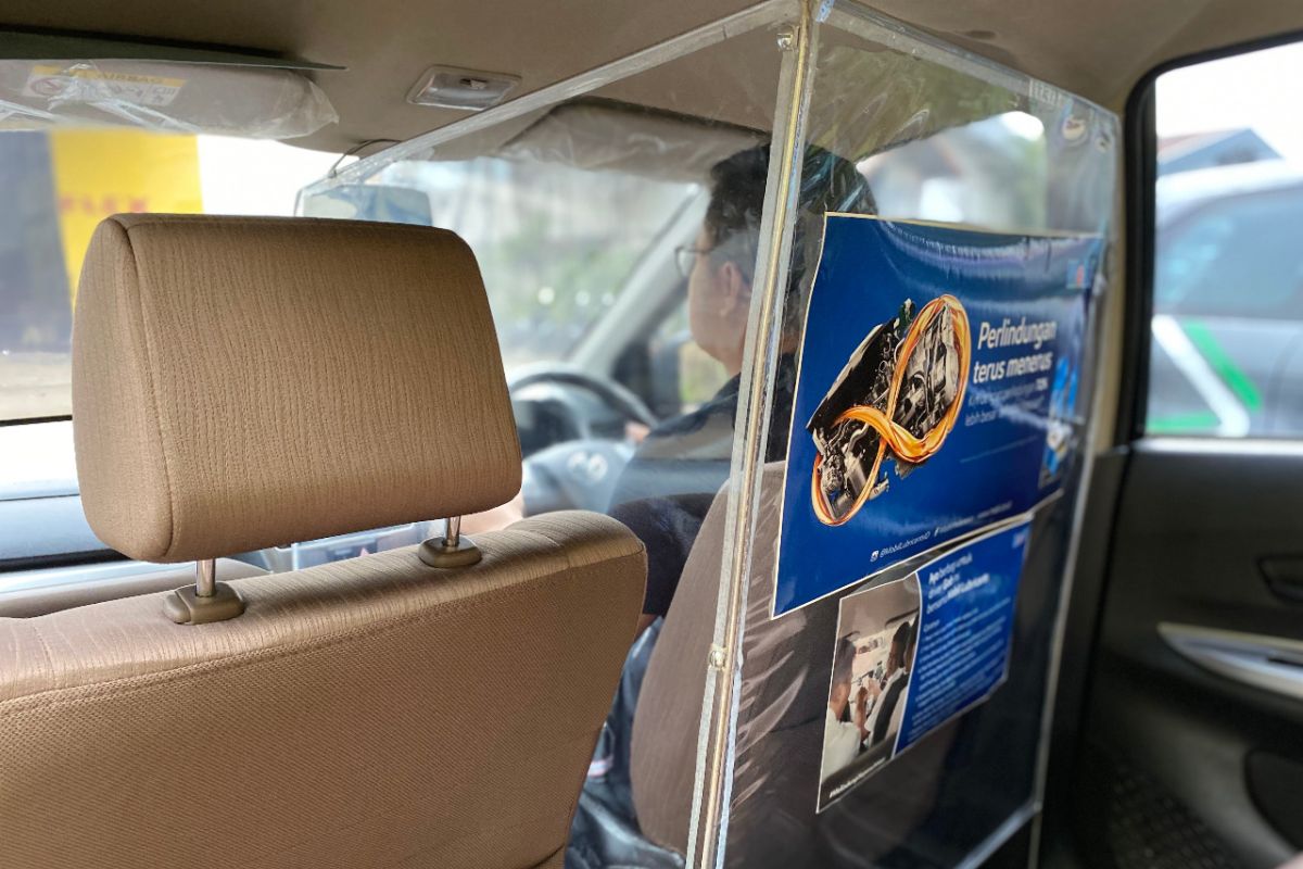 Mobil Lubricant berikan partisi pelindung kepada driver online