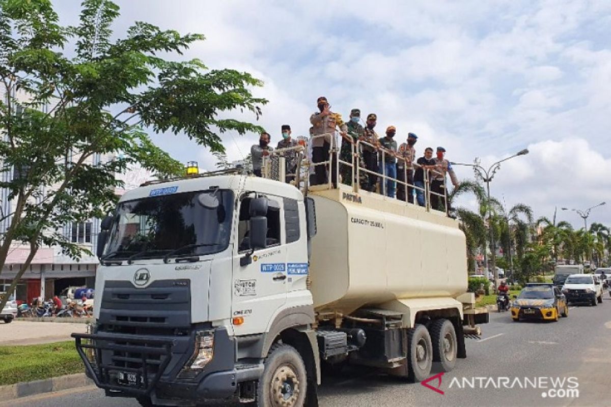 Cegah penyebaran COVID-19 ruas jalan Pangkalan Kerinci kembali disemprot disinfektan