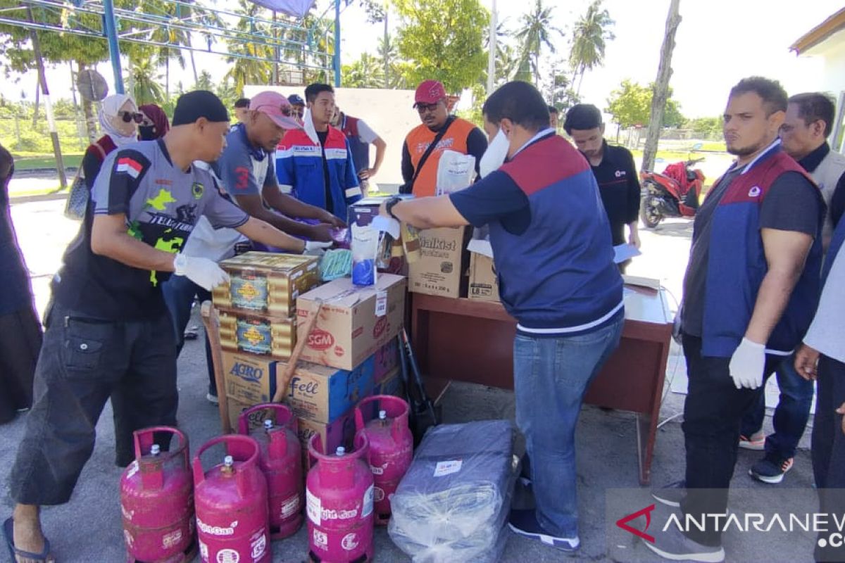 Pertamina-Hiswana Migas  salurkan bantuan logistik korban banjir Parigi