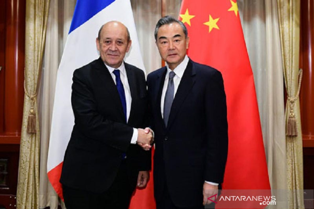 Kepada Menlu Prancis, Wang Yi nyatakan siap bersikap tegas terhadap AS