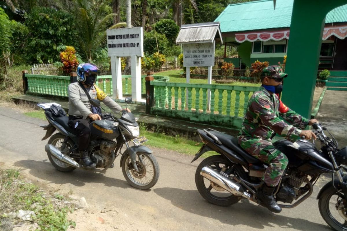 Bhabinkamtibmas Desa Beringin Rayo ikut sukseskan program TMMD 108