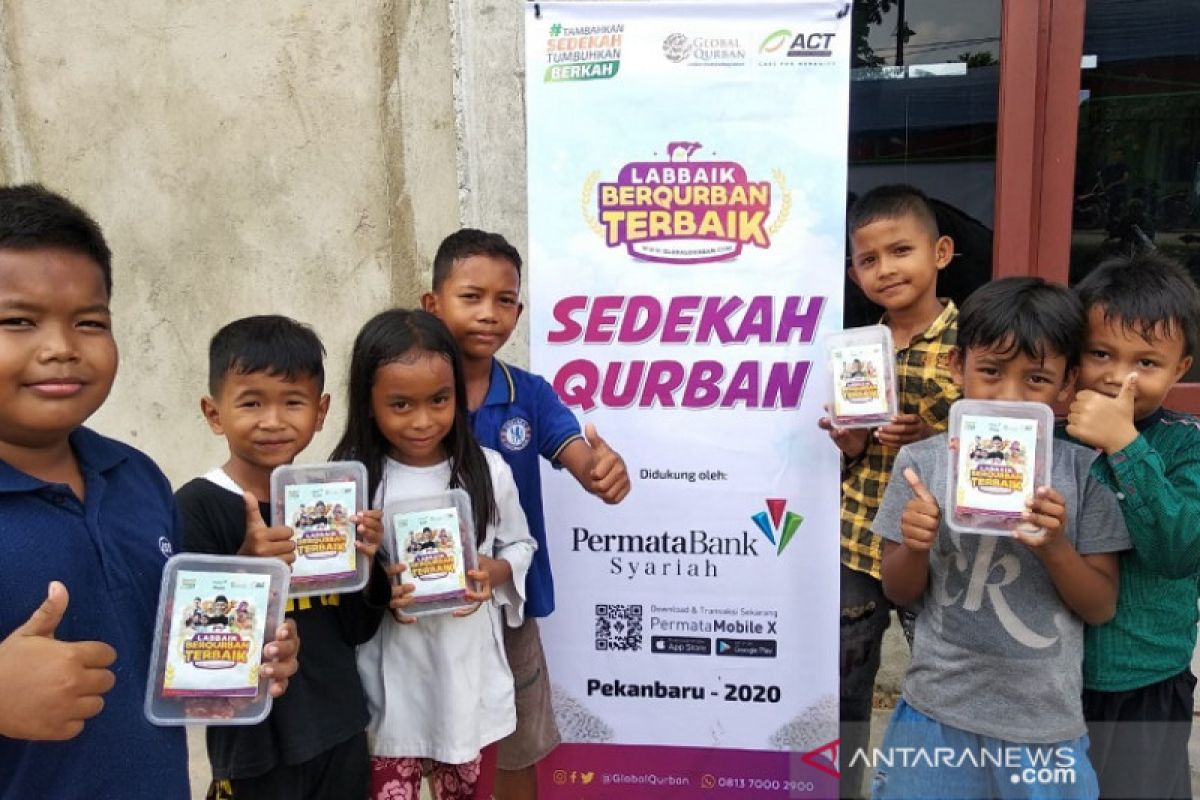 Global Qurban-ACT Riau bersama Bank Permata Syariah salurkan kurban di Dusun IV Kasang Kulim Kampar