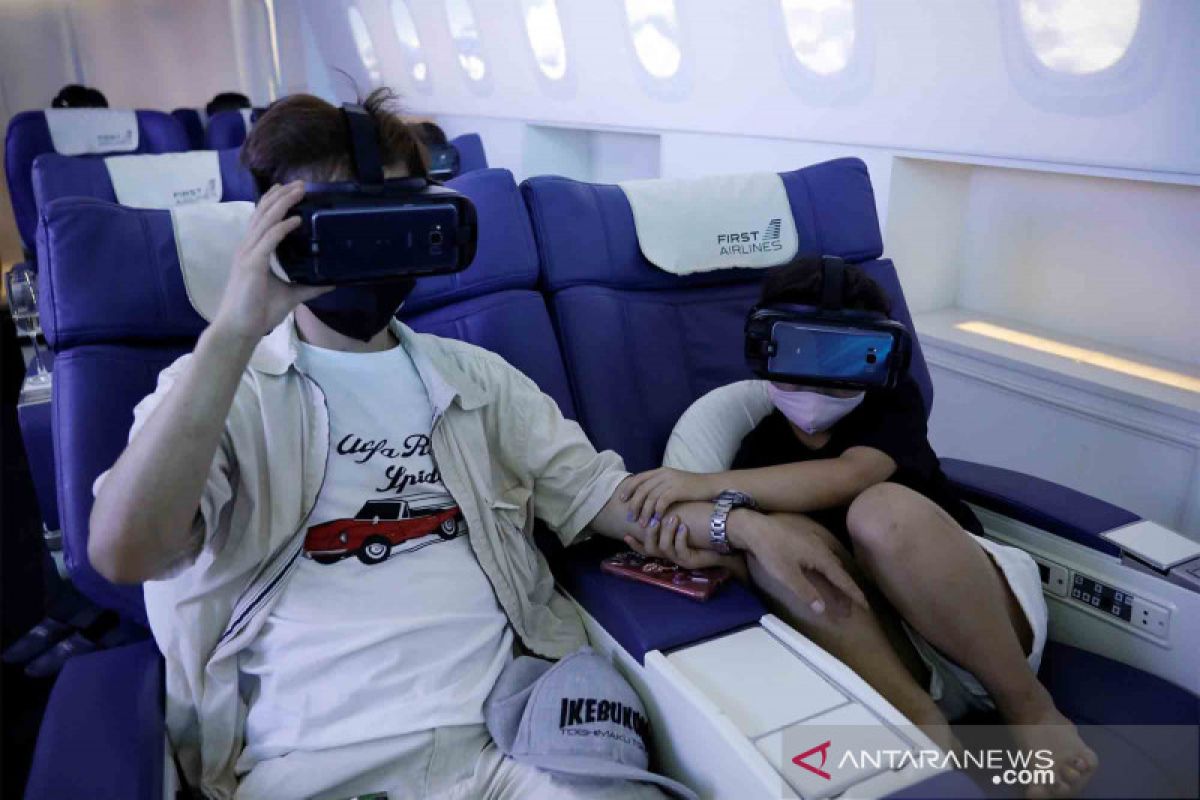 Liburan virtual dalam kabin pesawat kelas bisnis