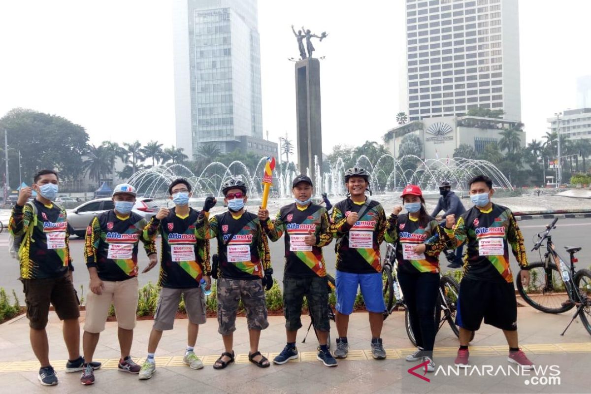 Jelajah Nusantara, Alfamart Gowes Berakhir di Tugu Libra Merauke