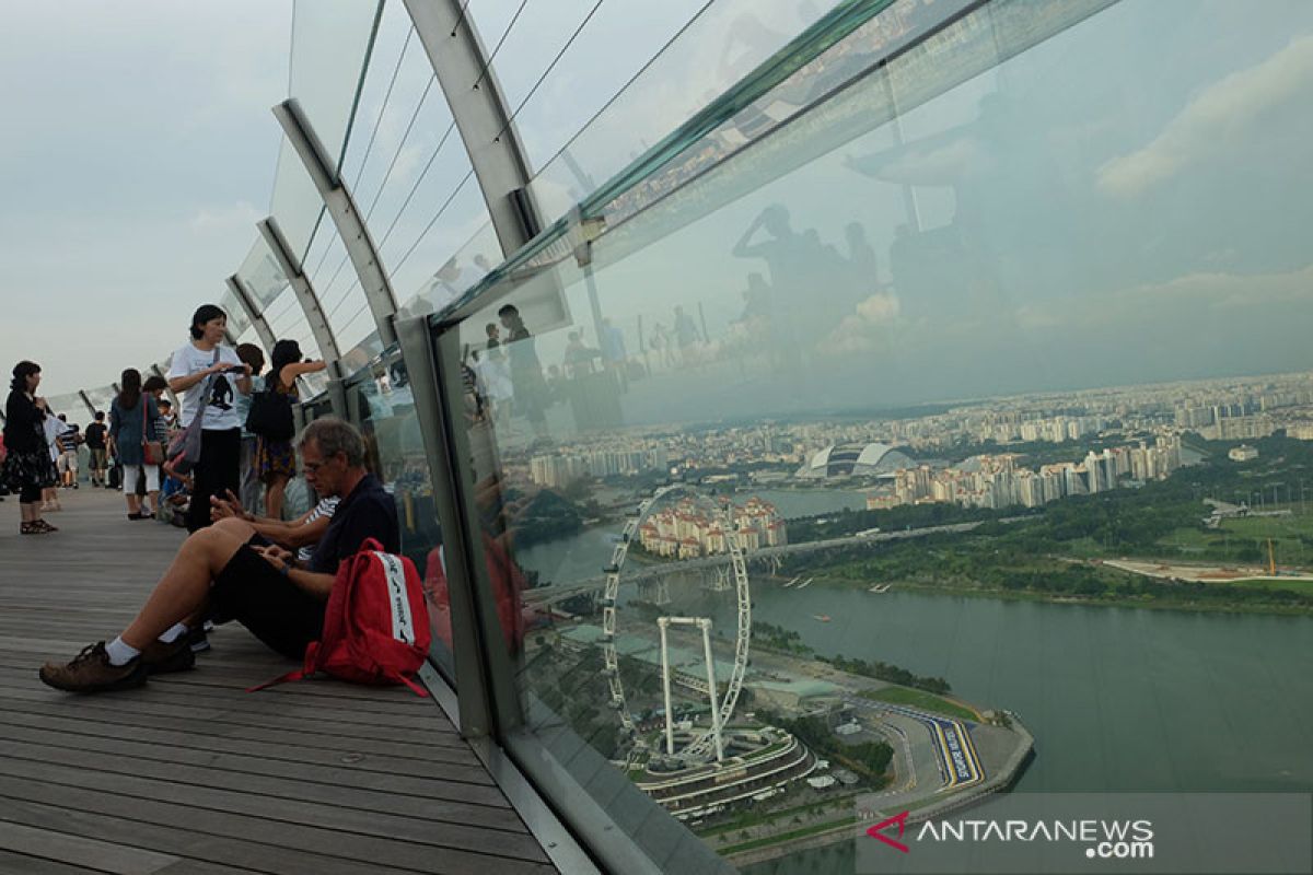 Singapura sambut wisatawan, berapa harga tiket pesawatnya?