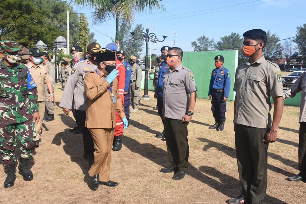 Pemkab Lombok Utara apel gelar pasukan tanda implementasi Perda NTB Nomor 7 tahun 2020
