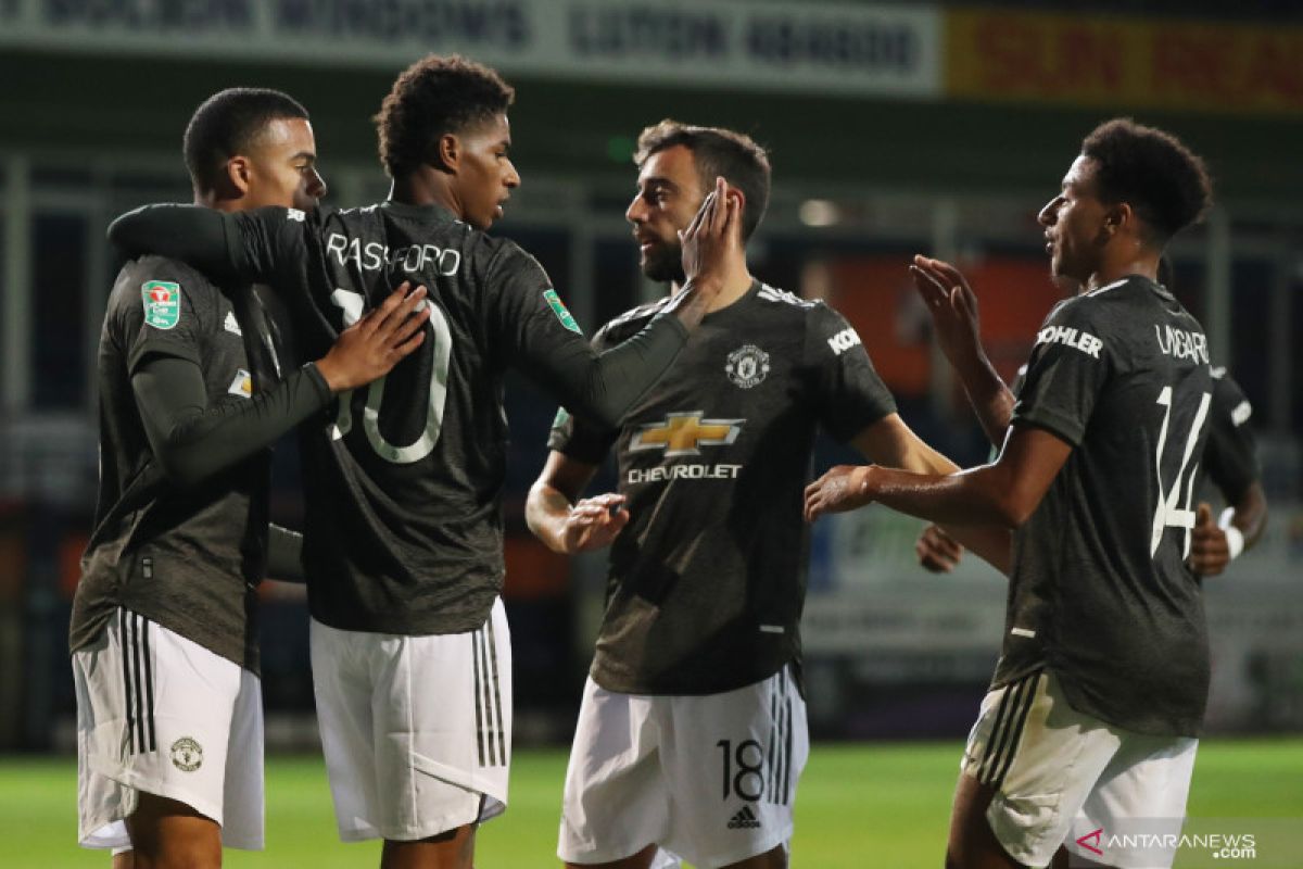 United melaju ke putaran empat berkat kemenangan 3-0 atas Luton