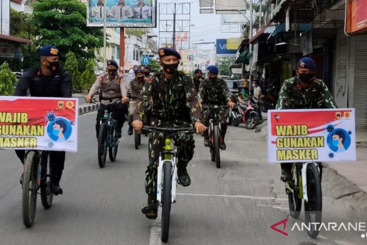 Brimob Polda Sumut sosialisasi protokol kesehatan dengan bersepeda