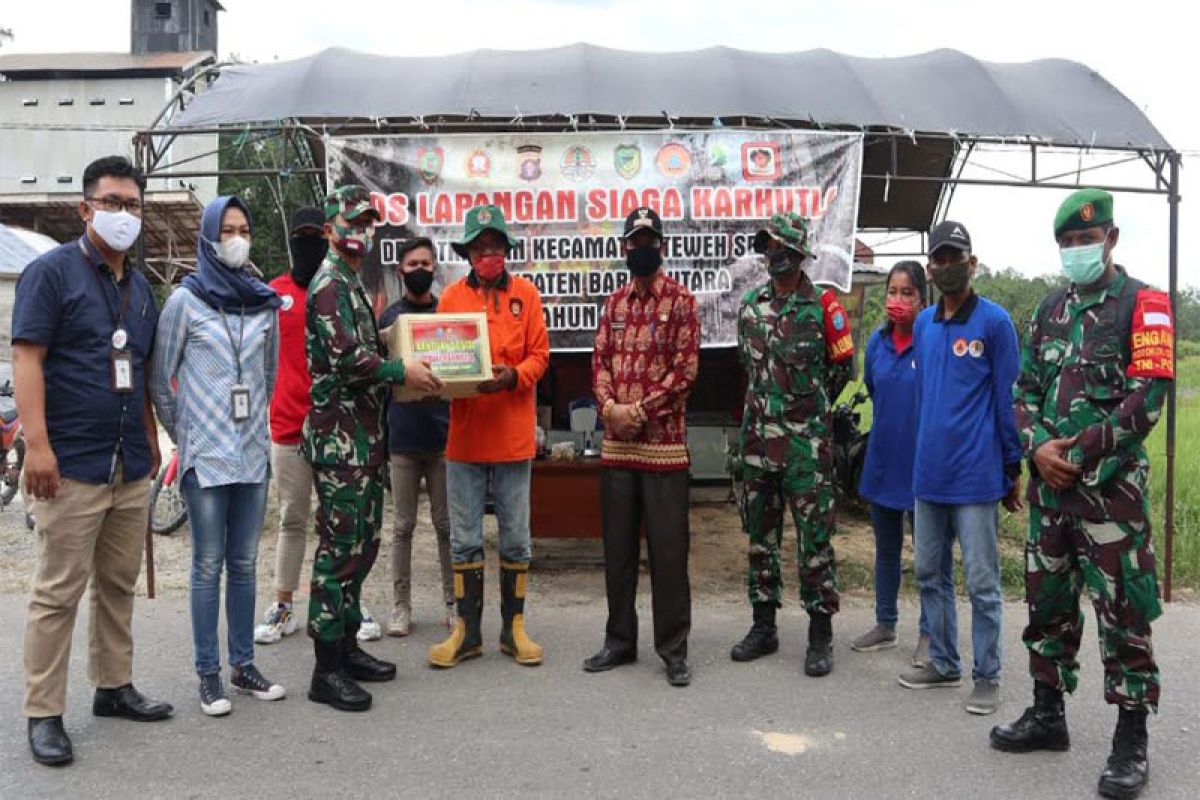 Kodim dan BRI Muara Teweh berikan bansos  Poslap Karhutla