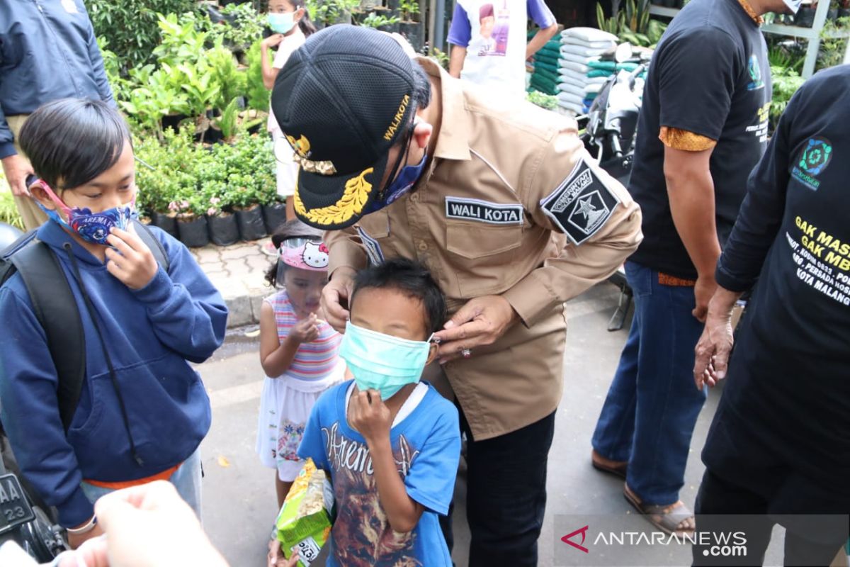 PWI Malang Raya gandeng BPJS Kesehatan bagikan 4.000 masker