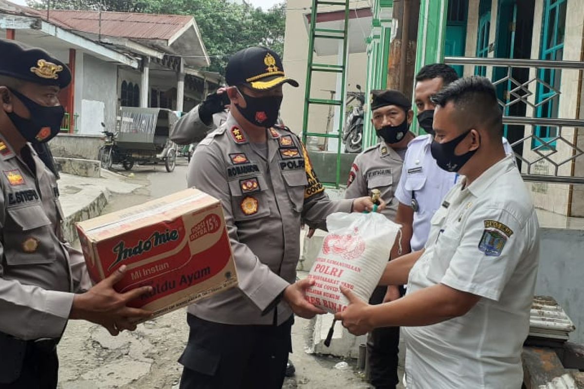 Kapolres Binjai bantu korban banjir