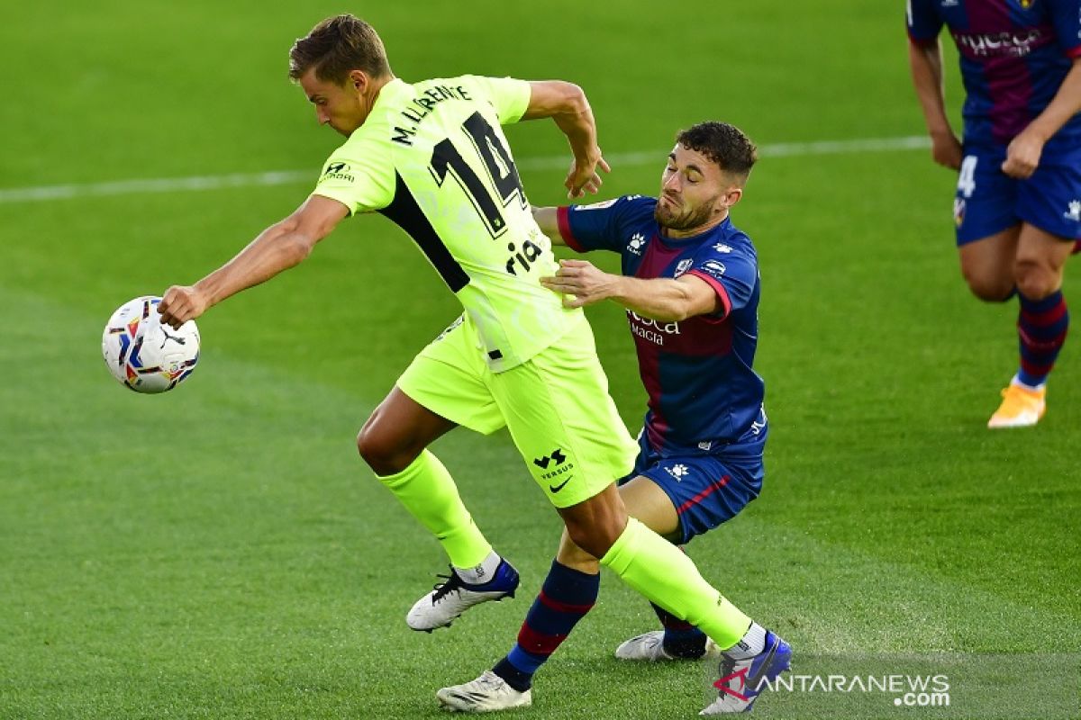 Atletico ditahan 0-0 lawan tim promosi  Huesca