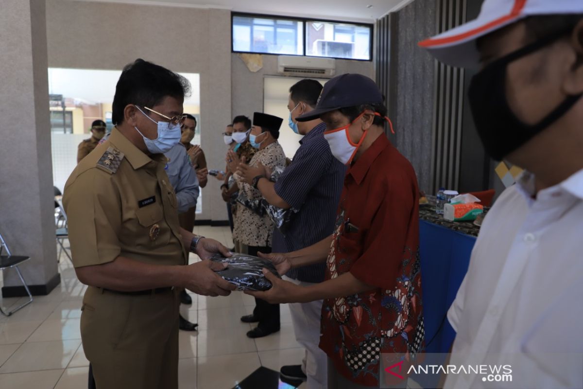 Putus penyebaran COVID-19, BPBD Kota Tangerang bagikan masker kain ke 1.014 RW