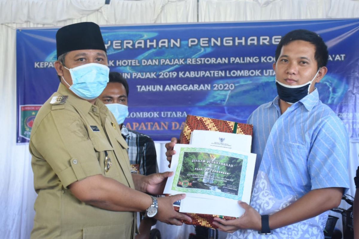 Plt Bupati Lombok Utara menghadiri penyerahan hadiah wajib pajak kooperatif
