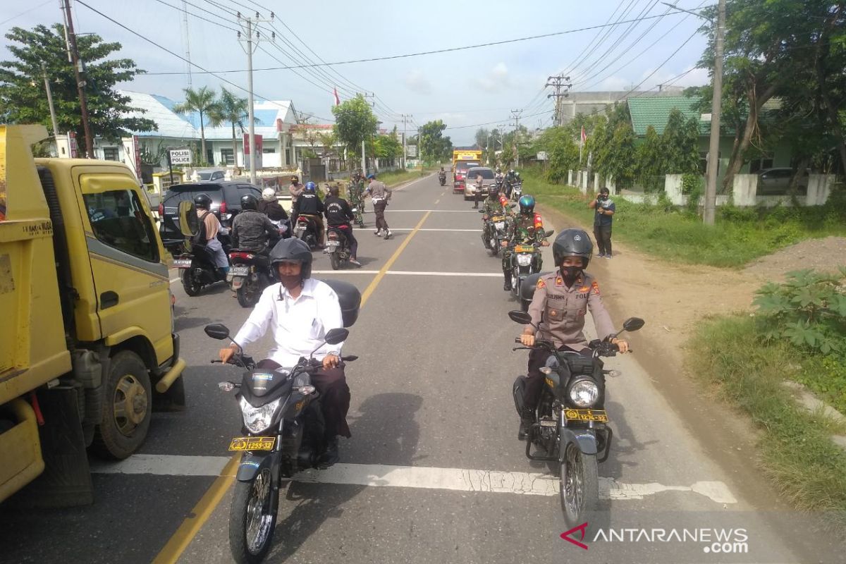 Polsek Syamtalira Bayu modifikasi motor prokes COVID-19 saat patroli rutin
