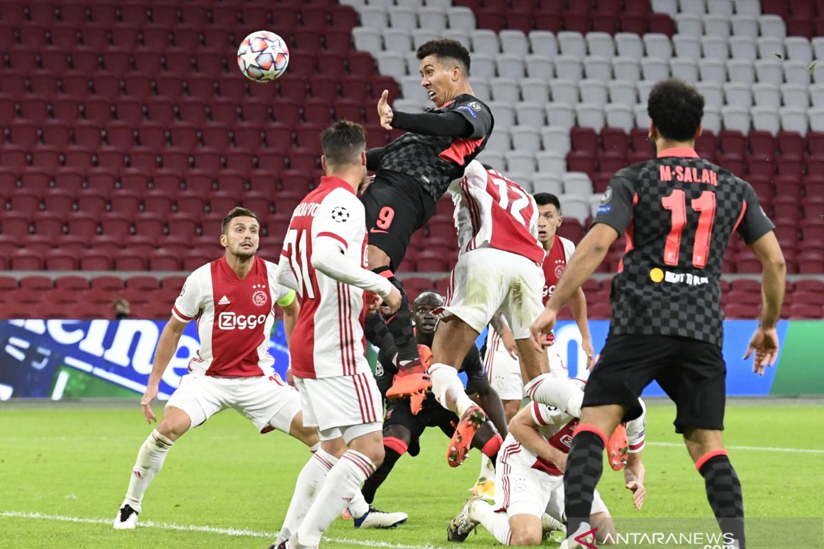 Liverpool curi poin penuh dari Ajax berkat gol bunuh diri Tagliafico