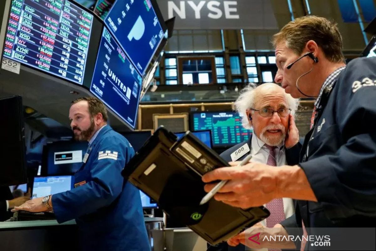 Wall Street berakhir beragam dengan stimulus dan laba menjadi fokus