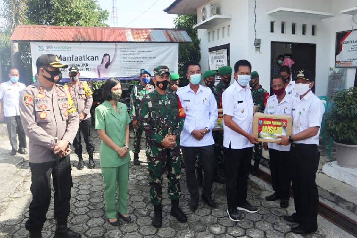 Bupati Barut hadiri pembagian masker massal Kodim 1013 Muara Teweh