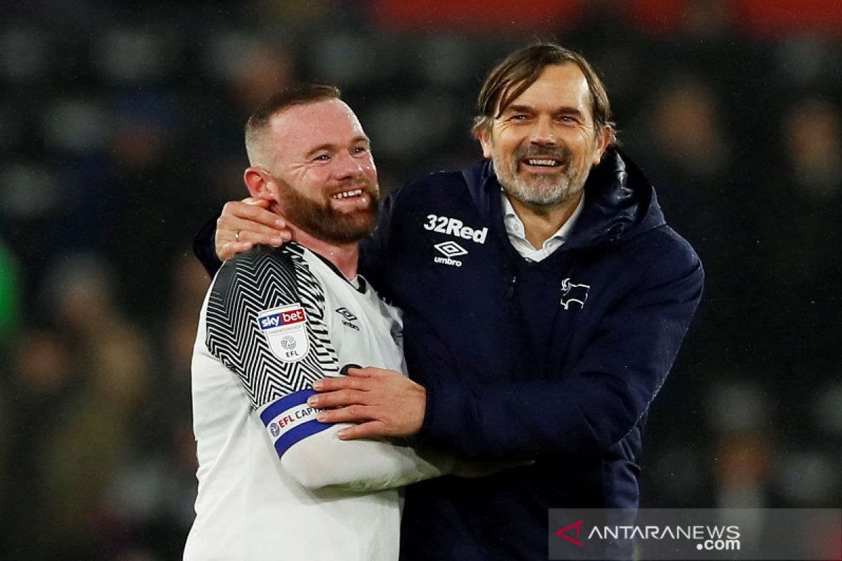 Wayne Rooney menjadi pelatih interim Derby setelah Phillip Cocu dipecat