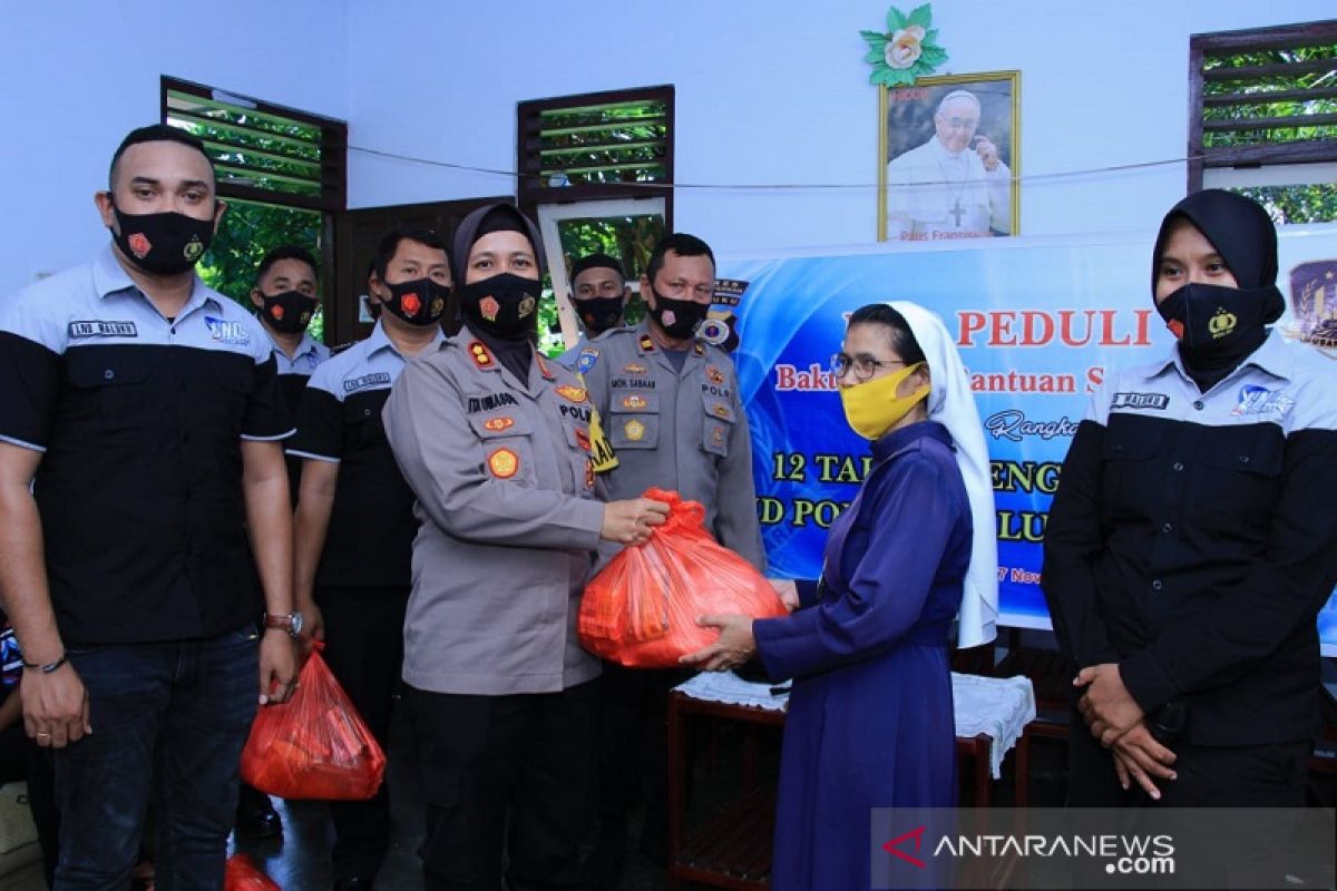 Polres Malteng santuni anak yatim dan warga Masohi