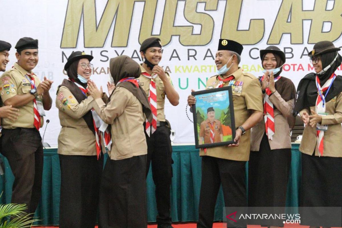 Husni terpilih ketua kwartir cabang gerakan  pramuka Kota Medan