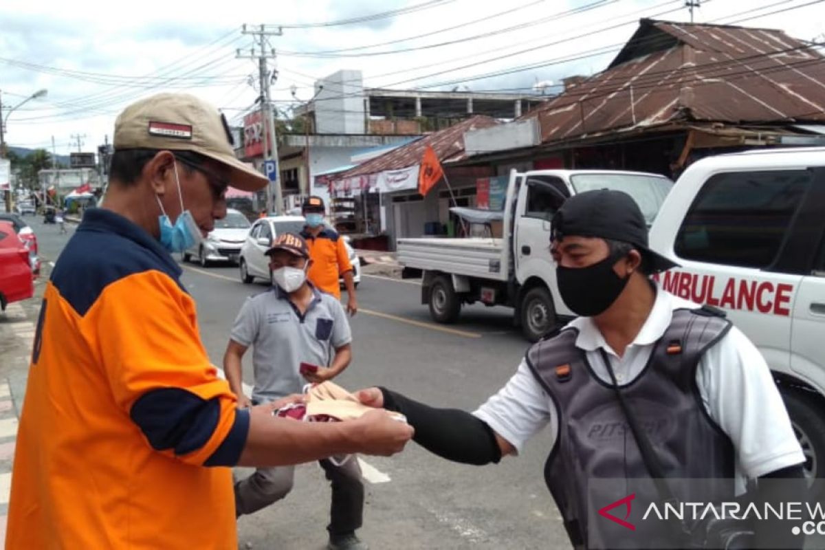 BPBD Minahasa Tenggara bagikan 2.500 masker bagi warga