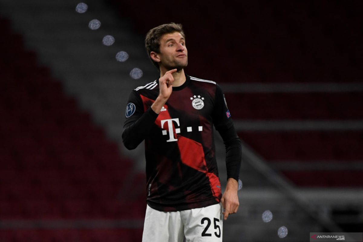 Gol penalti Thomas Mueller hambat  laju Atletico ke fase gugur