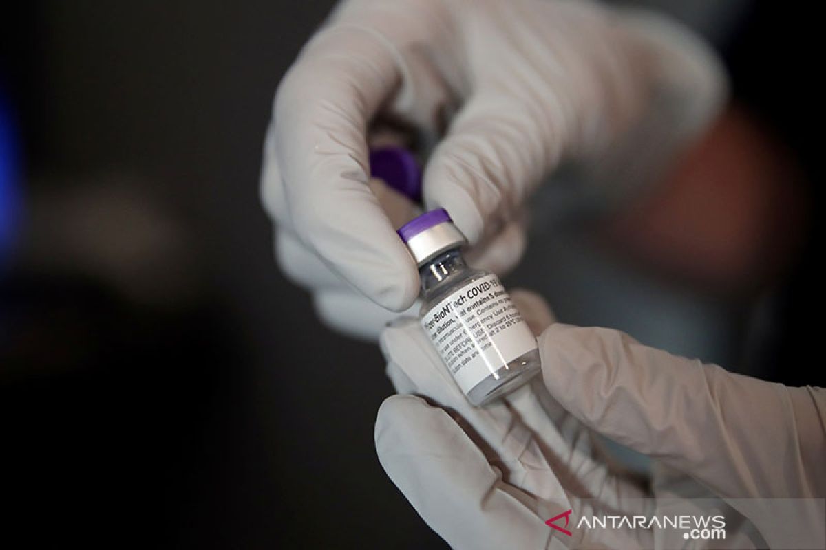 Swiss restui vaksin COVID Pfizer-BioNTech