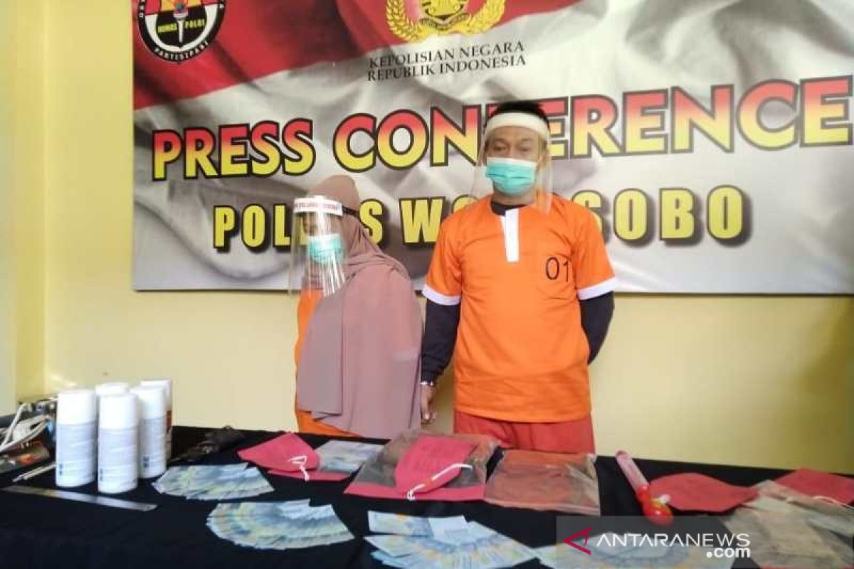 Pasutri pengedar uang palsu diringkus polisi