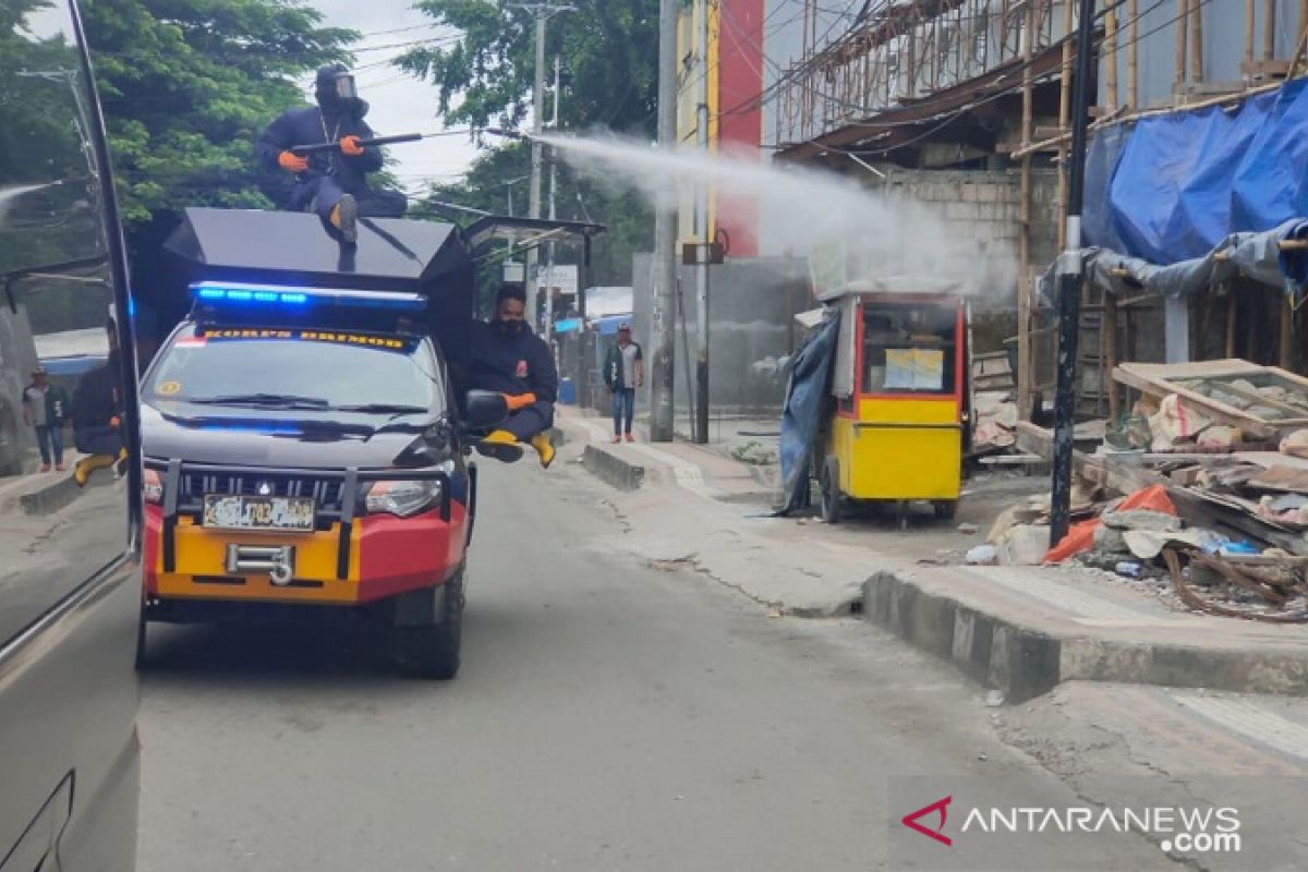 Brimob Plda Maluku cegah virus corona di tempat umum