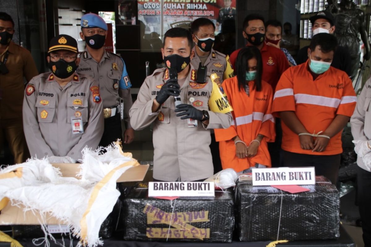 Two arrested, 2.4-million double L pills seized from Malang warehouse