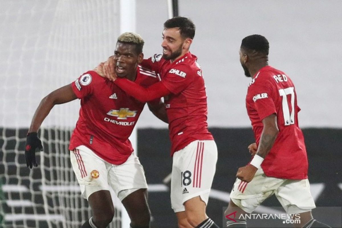 Paul Pogba antarkan Manchester United ke puncak klasemen