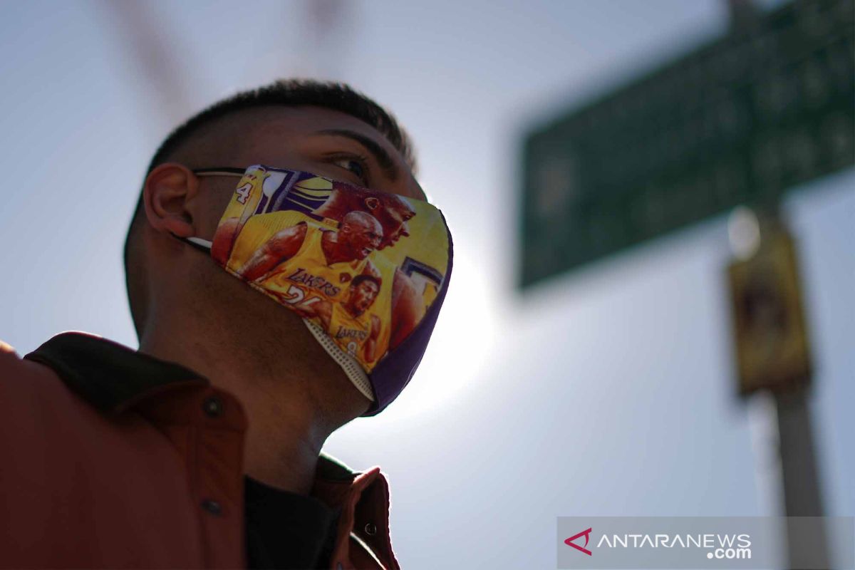 Ternyata orang Amerika masih butuh masker untuk lawan COVID pada 2022