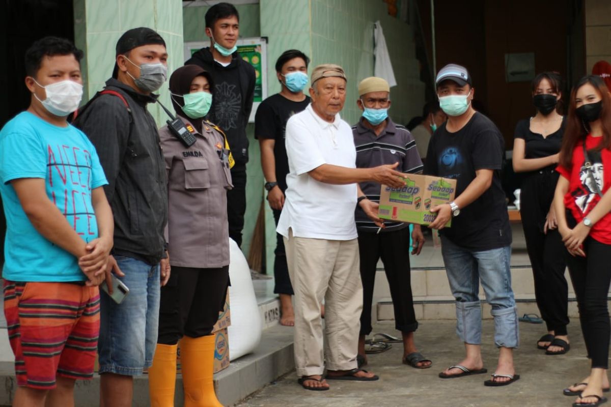 GPM bersama GMNI Minahasa bantu korban bencana Manado