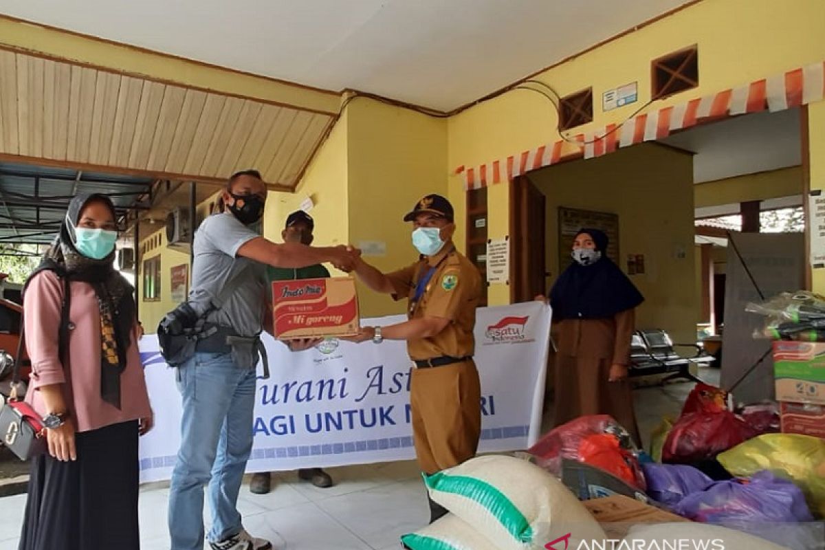 PT Persada Dinamika Lestari serahkan bantuan untuk warga terdampak banjir HSU