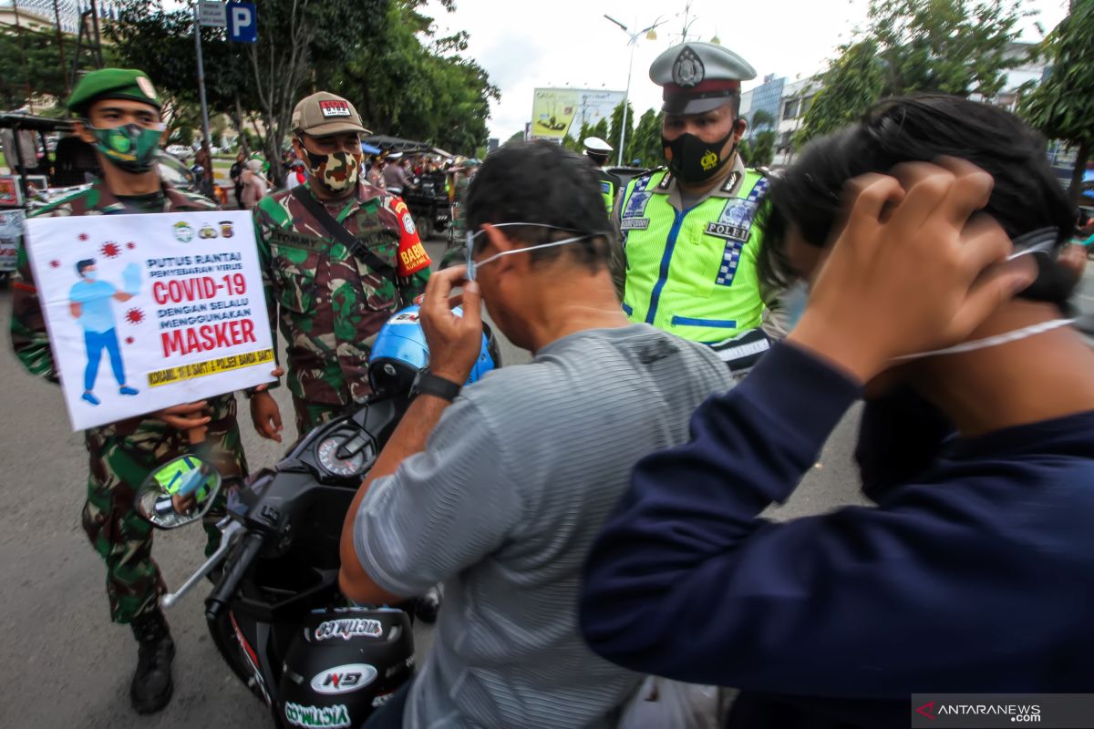 Pakai masker selama puasa bikin mulut lebih bau?