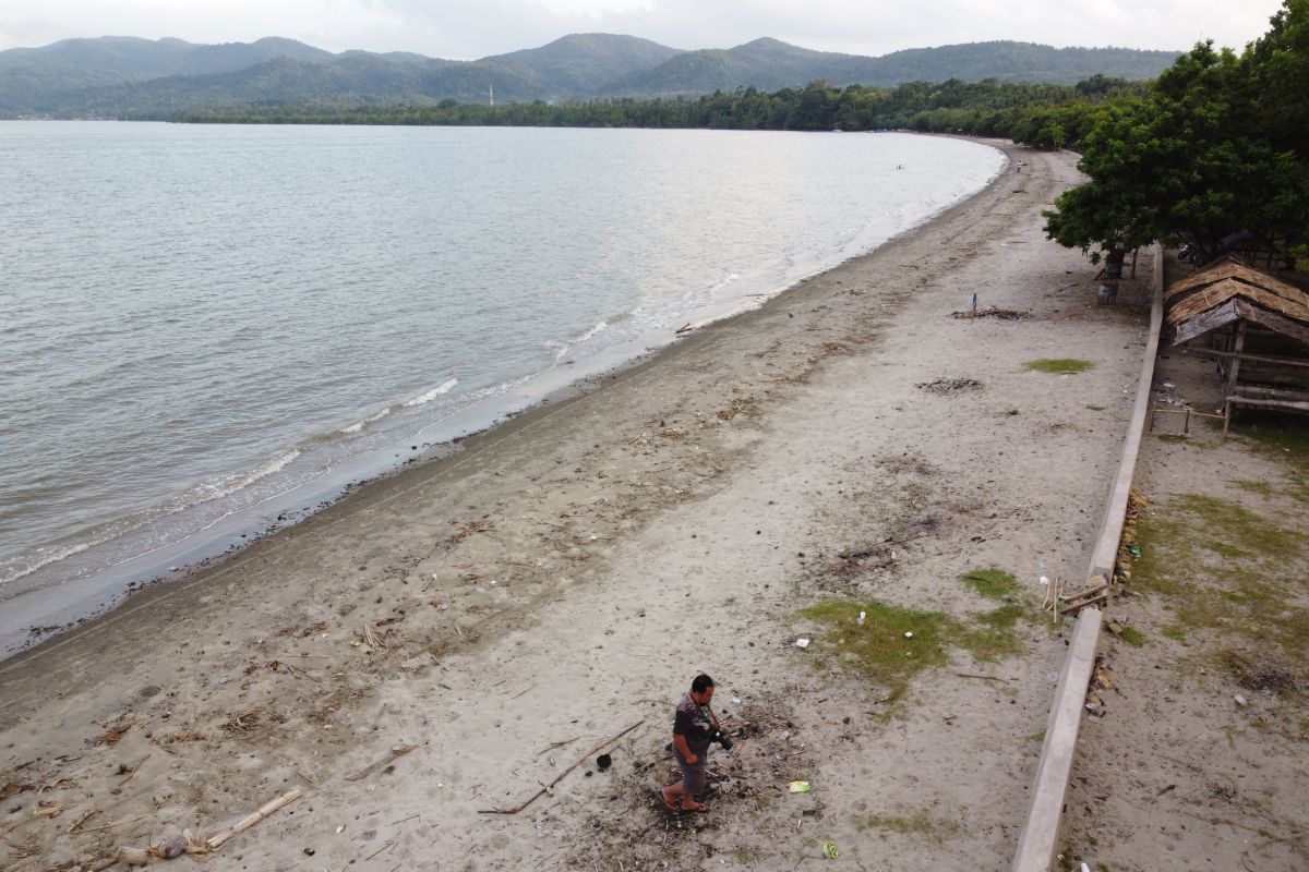 LOKASI WISATA PANTAI TERCEMAR LIMBAH PABRIK SMELTER