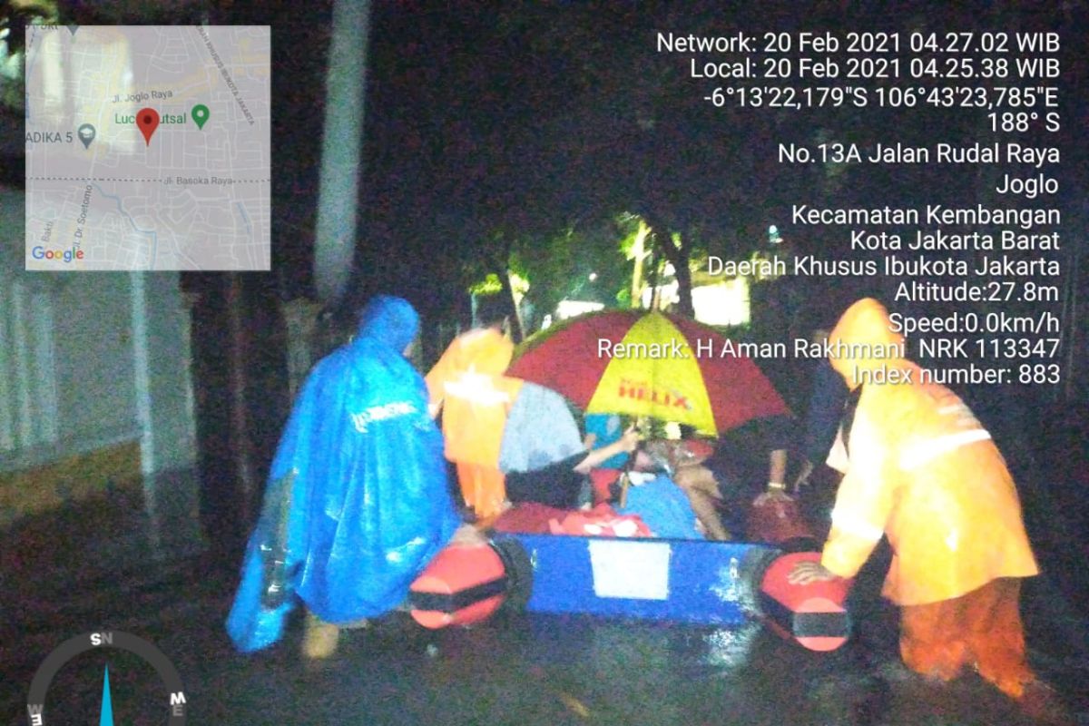 Satpol evacuates three trapped in flooded home in West Jakarta