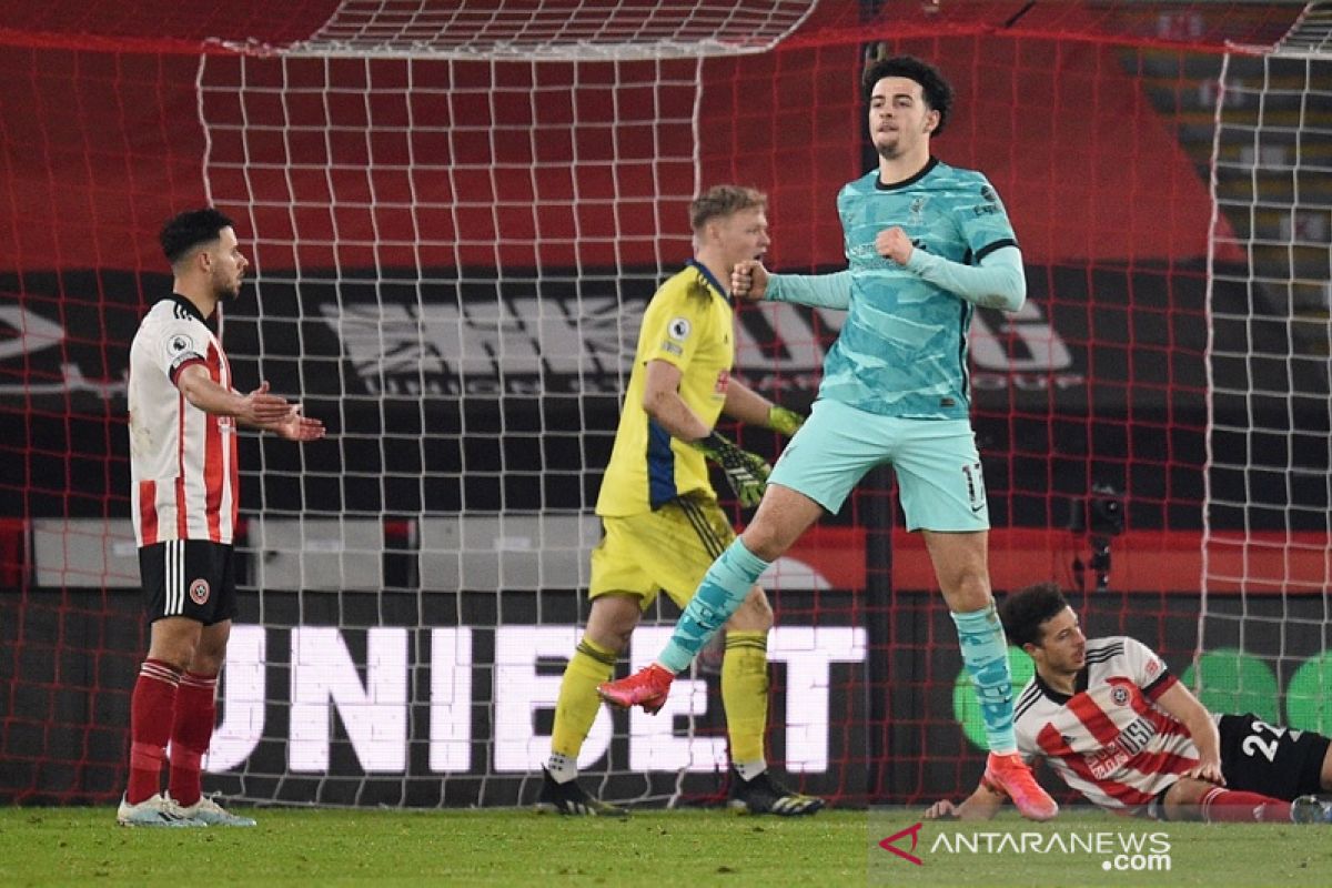 Liverpool akhirnya menang lagi setelah tundukkan juru kunci Sheffield 2-0