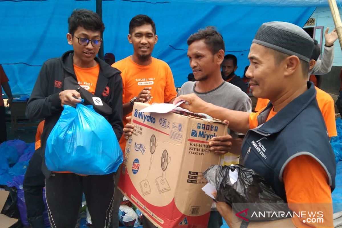 GPS Al-Umm redistributes aid for flood victims