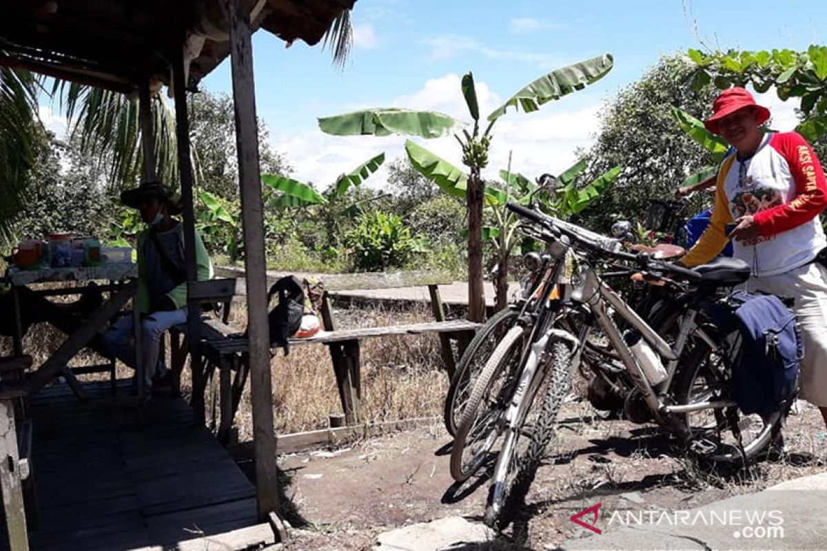 Bersepeda seraya berwisata ke pinggiran tren baru warga Banjarmasin