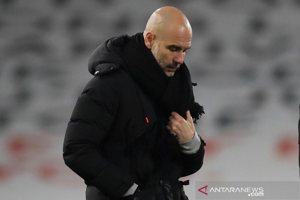 Guardiola : tak realistis bicarakan peluang caturgelar City