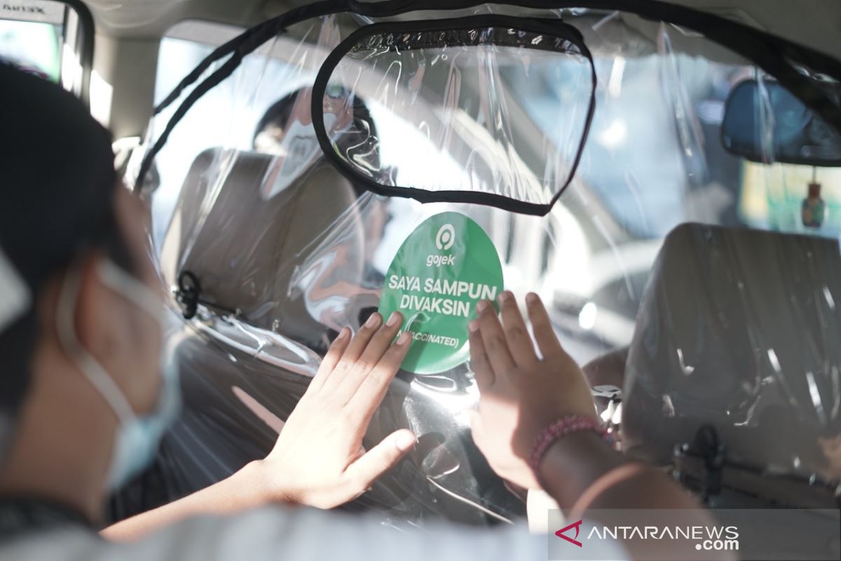 Mitra Driver Gojek di Bali ikuti vaksinasi bersama anggota TNI-Polri
