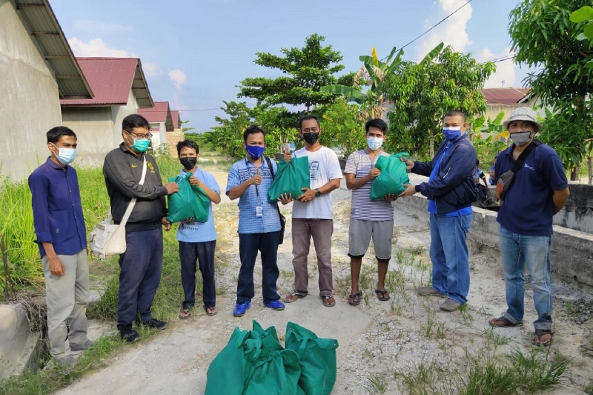 Kolaborasi XL dan PFI Pekanbaru salurkan bantuan sembako untuk warga "langganan" banjir